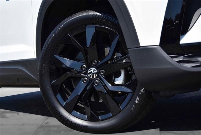 used 2024 Volkswagen Taos car, priced at $24,995