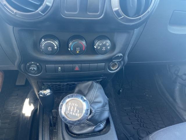 used 2015 Jeep Wrangler car, priced at $17,996