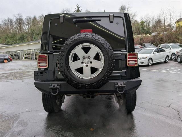 used 2012 Jeep Wrangler Unlimited car, priced at $13,998