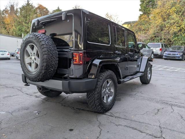 used 2013 Jeep Wrangler Unlimited car, priced at $13,500