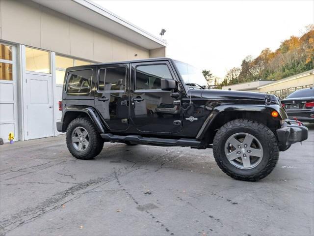 used 2013 Jeep Wrangler Unlimited car, priced at $13,500