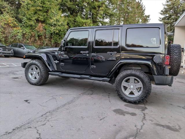 used 2013 Jeep Wrangler Unlimited car, priced at $13,500