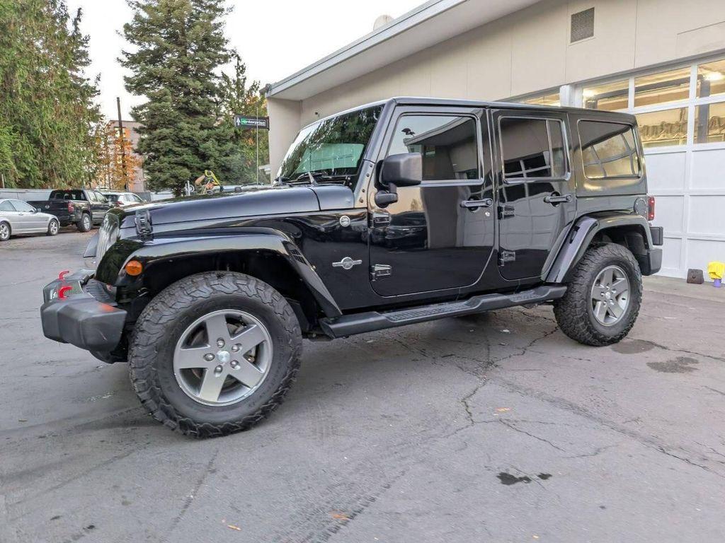 used 2013 Jeep Wrangler Unlimited car, priced at $10,800