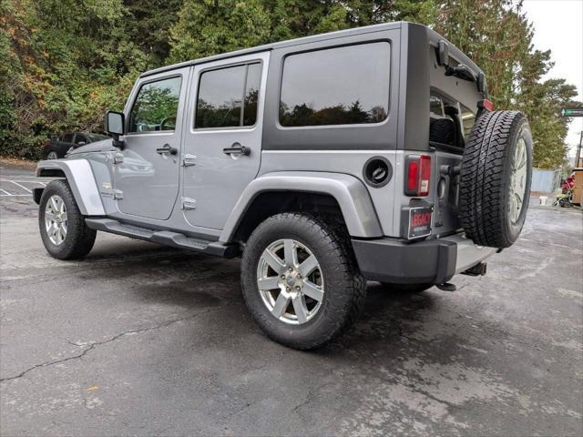 used 2013 Jeep Wrangler Unlimited car, priced at $14,400