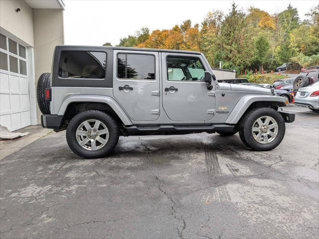 used 2013 Jeep Wrangler Unlimited car, priced at $14,400