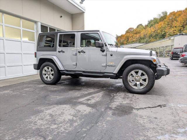 used 2013 Jeep Wrangler Unlimited car, priced at $14,400