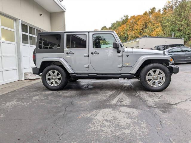 used 2013 Jeep Wrangler Unlimited car, priced at $14,400