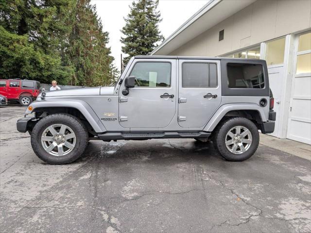 used 2013 Jeep Wrangler Unlimited car, priced at $14,400