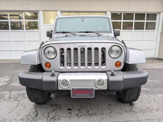 used 2013 Jeep Wrangler Unlimited car, priced at $14,400