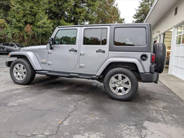 used 2013 Jeep Wrangler Unlimited car, priced at $14,400