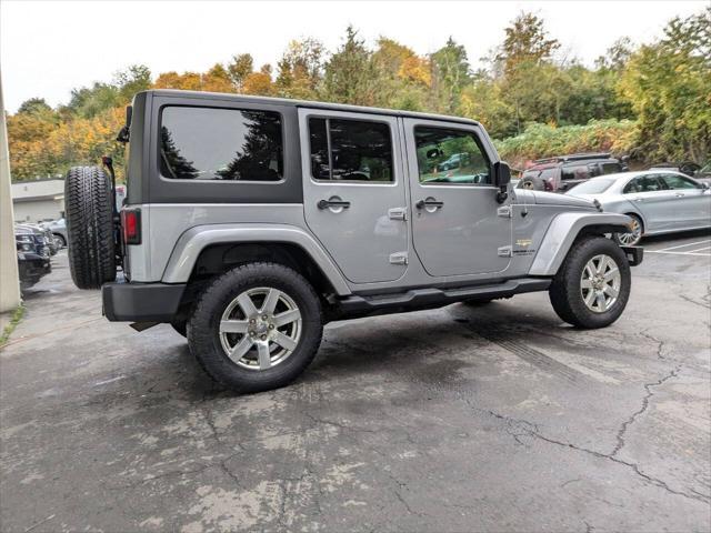 used 2013 Jeep Wrangler Unlimited car, priced at $14,400