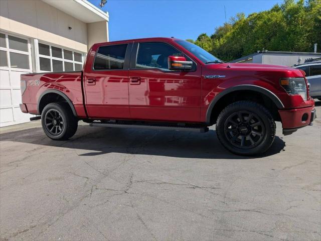 used 2014 Ford F-150 car, priced at $18,998
