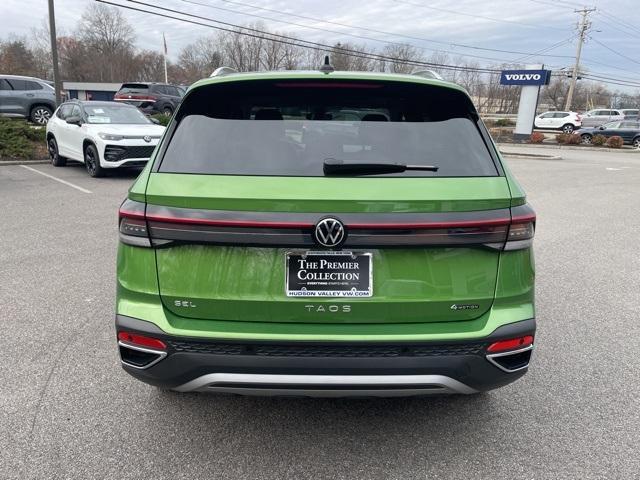 used 2025 Volkswagen Taos car, priced at $31,086