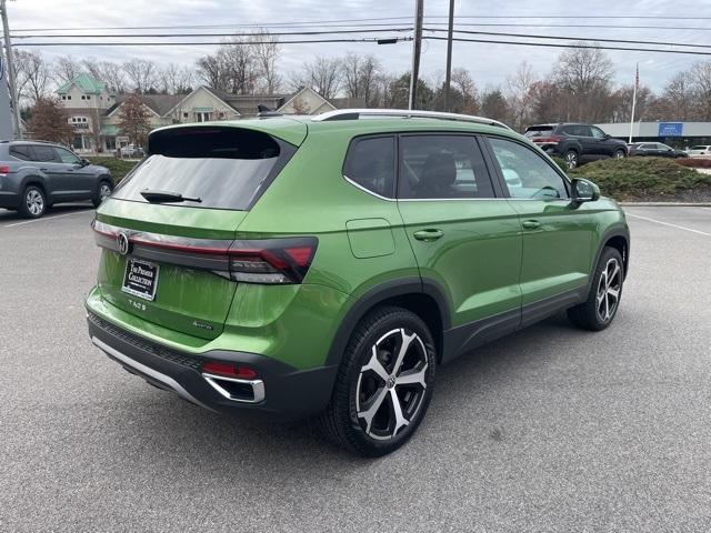 used 2025 Volkswagen Taos car, priced at $31,086