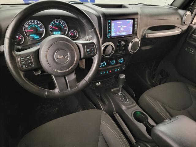 used 2015 Jeep Wrangler Unlimited car, priced at $20,224