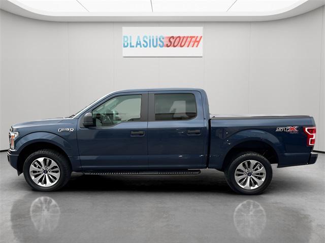 used 2018 Ford F-150 car, priced at $25,821