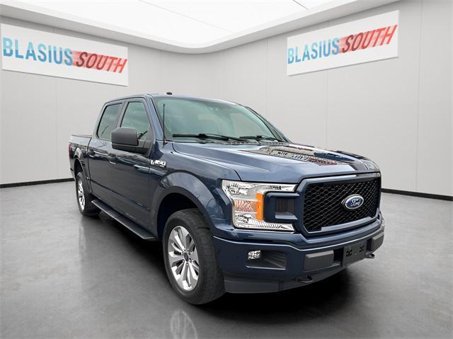 used 2018 Ford F-150 car, priced at $25,821