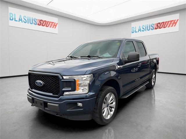 used 2018 Ford F-150 car, priced at $25,821