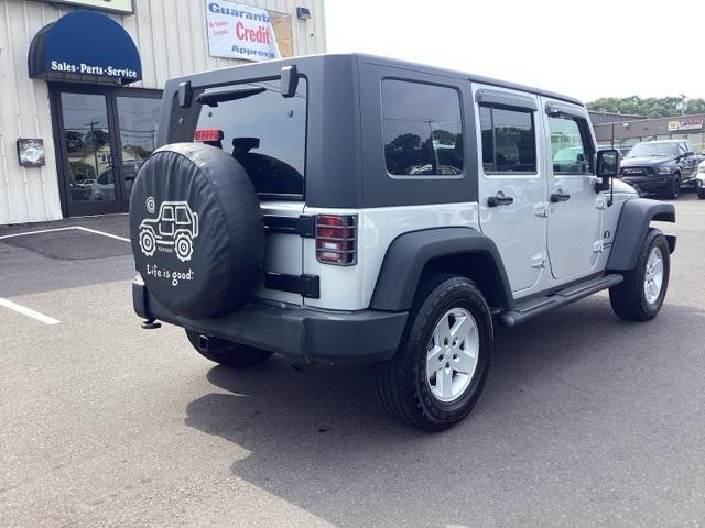 used 2009 Jeep Wrangler Unlimited car, priced at $11,988