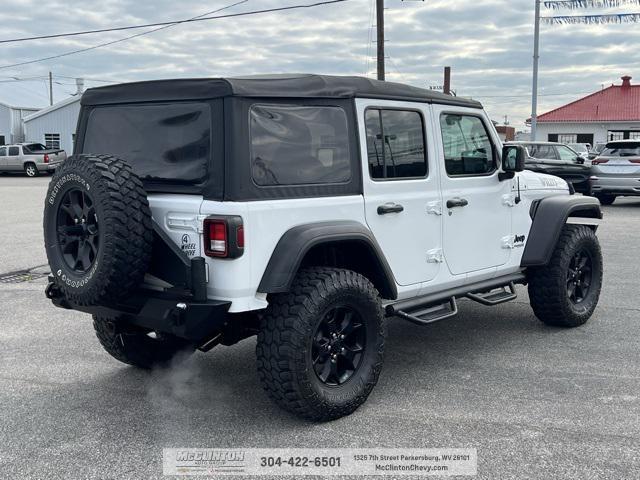 used 2021 Jeep Wrangler Unlimited car, priced at $29,792