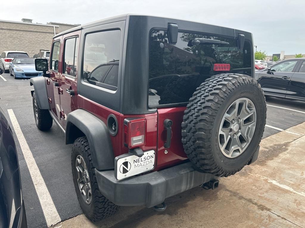 used 2013 Jeep Wrangler Unlimited car, priced at $23,994