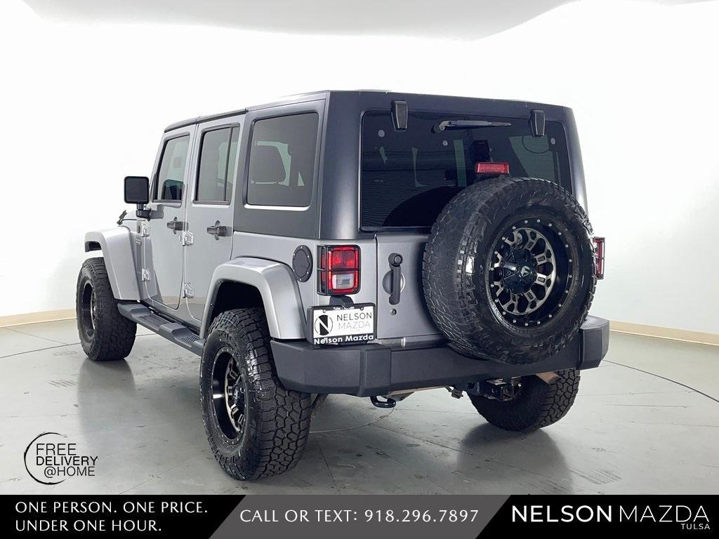 used 2016 Jeep Wrangler Unlimited car, priced at $18,390