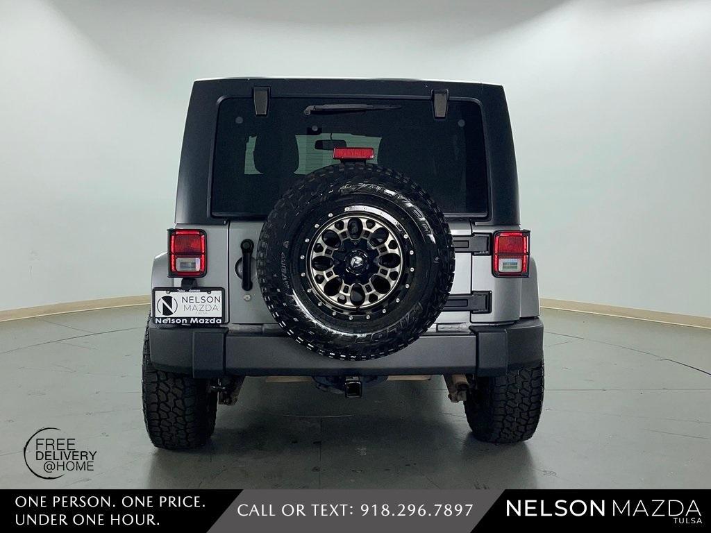 used 2016 Jeep Wrangler Unlimited car, priced at $18,390