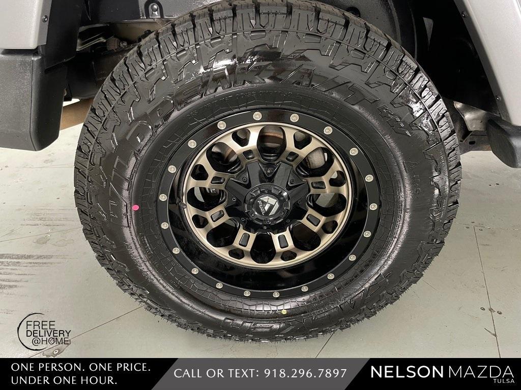 used 2016 Jeep Wrangler Unlimited car, priced at $18,390