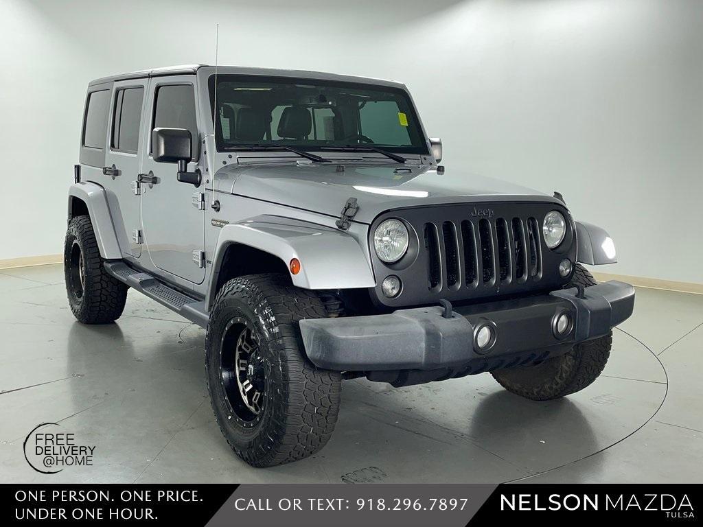 used 2016 Jeep Wrangler Unlimited car, priced at $18,390