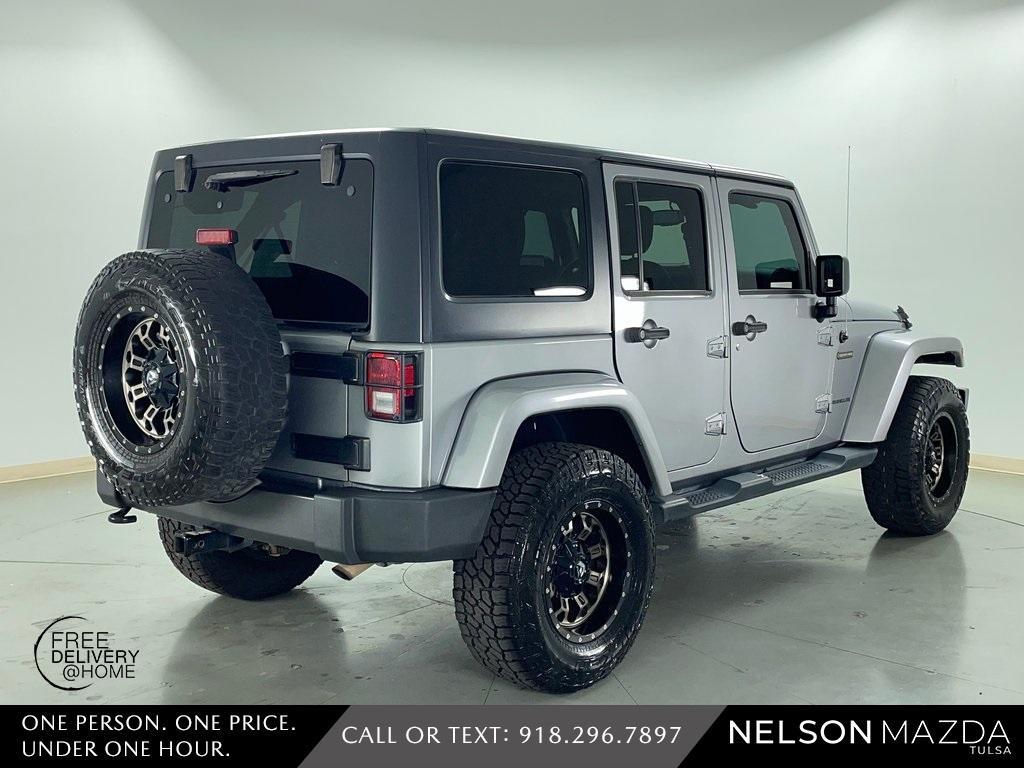 used 2016 Jeep Wrangler Unlimited car, priced at $18,390