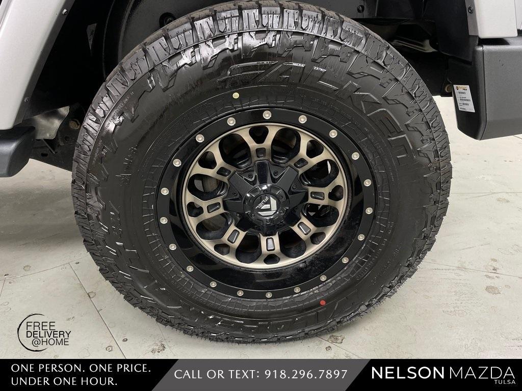 used 2016 Jeep Wrangler Unlimited car, priced at $18,390