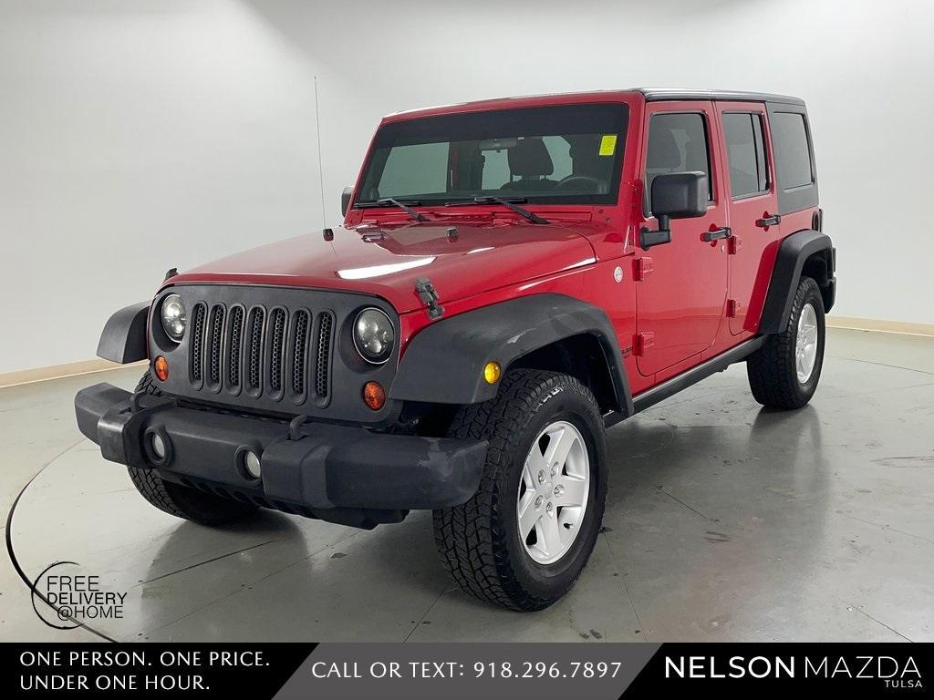 used 2013 Jeep Wrangler Unlimited car, priced at $19,119