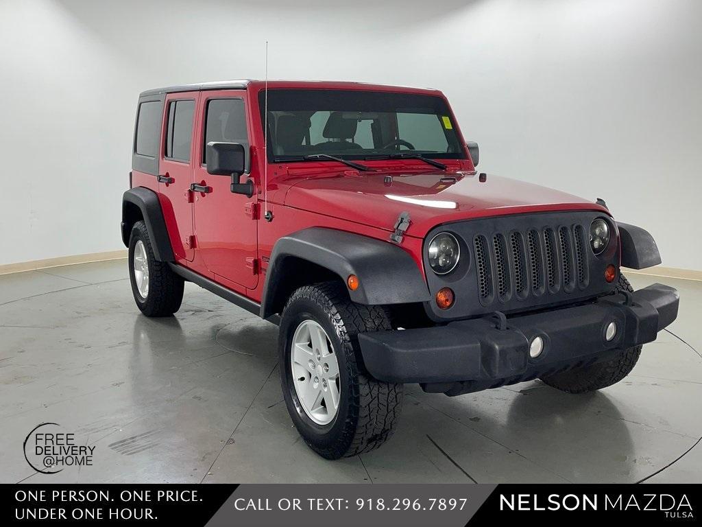 used 2013 Jeep Wrangler Unlimited car, priced at $19,119