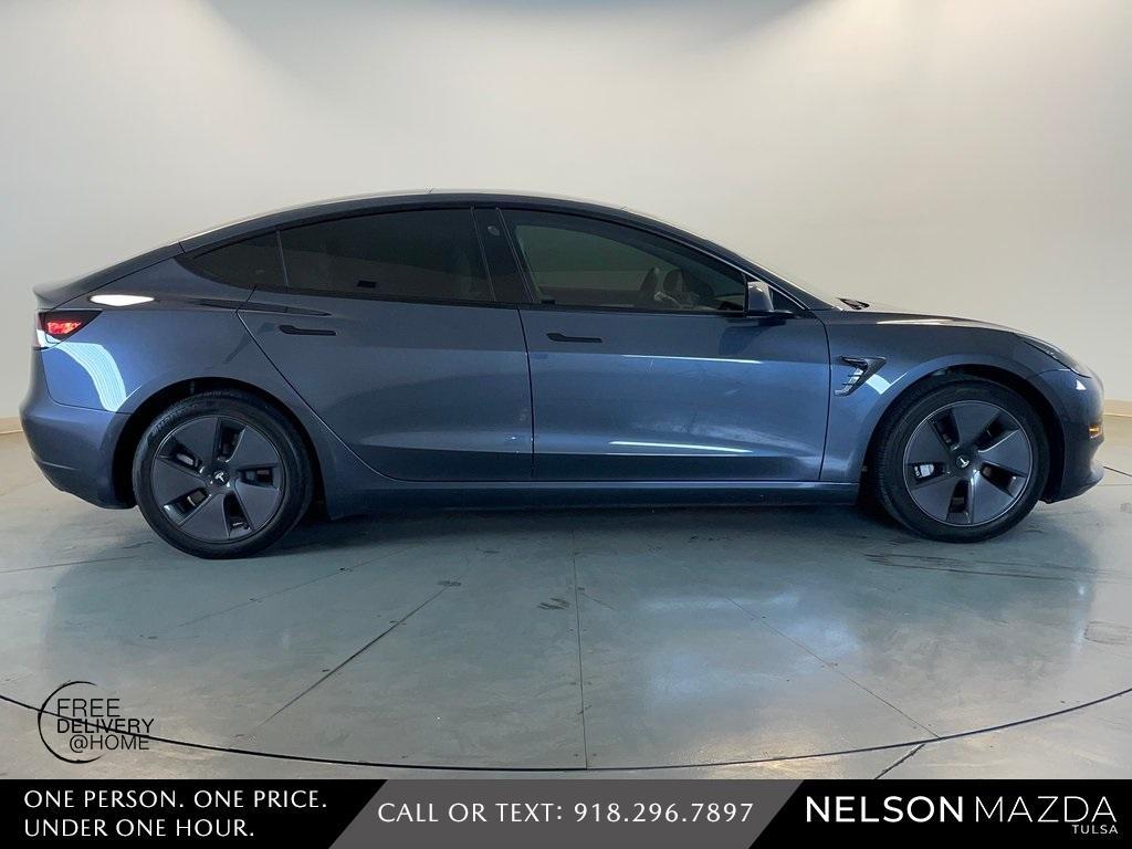 used 2022 Tesla Model 3 car, priced at $25,130