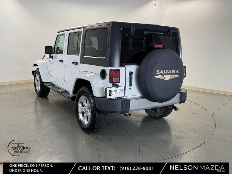 used 2014 Jeep Wrangler Unlimited car, priced at $20,595