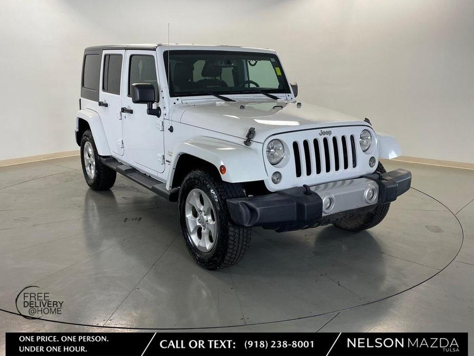 used 2014 Jeep Wrangler Unlimited car, priced at $20,595