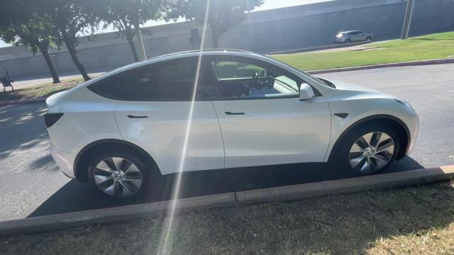used 2023 Tesla Model Y car, priced at $28,489