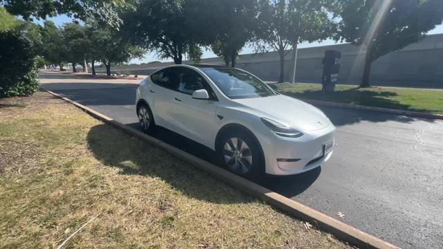 used 2023 Tesla Model Y car, priced at $28,489