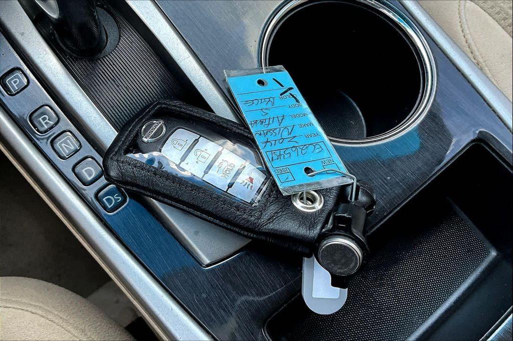 used 2014 Nissan Altima car, priced at $6,900