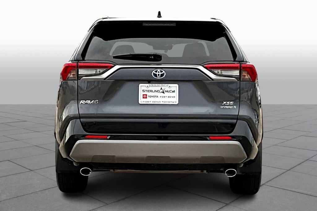 used 2021 Toyota RAV4 Hybrid car, priced at $26,000