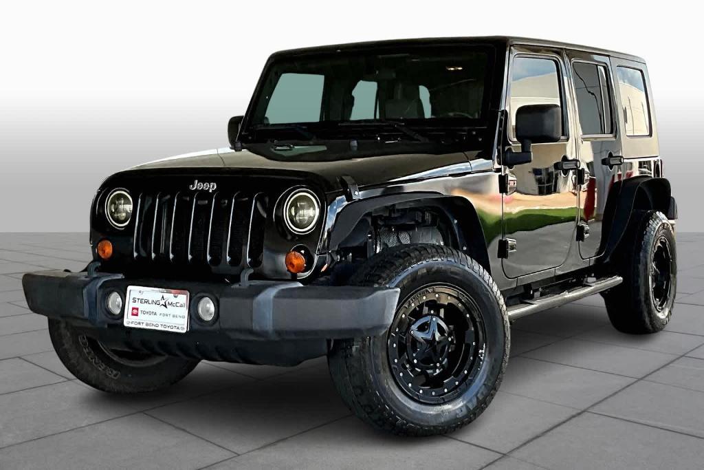 used 2010 Jeep Wrangler Unlimited car, priced at $15,200
