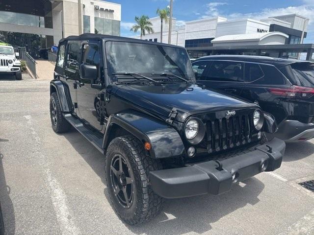 used 2015 Jeep Wrangler Unlimited car, priced at $18,391
