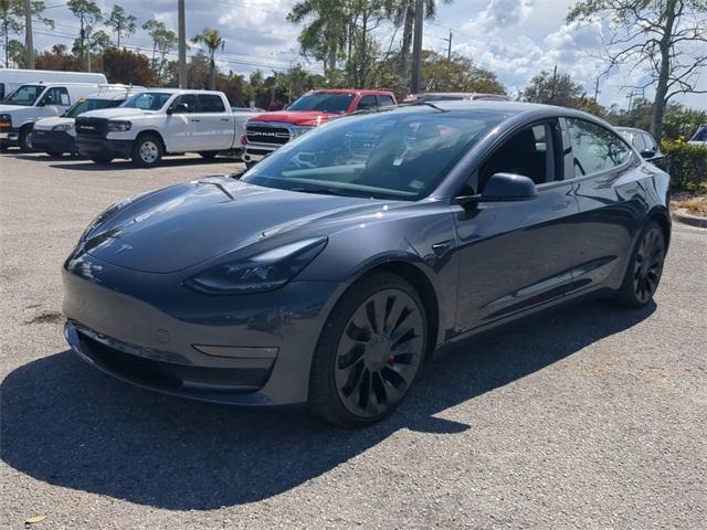 used 2023 Tesla Model 3 car, priced at $34,394