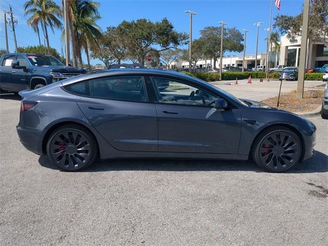 used 2023 Tesla Model 3 car, priced at $34,394