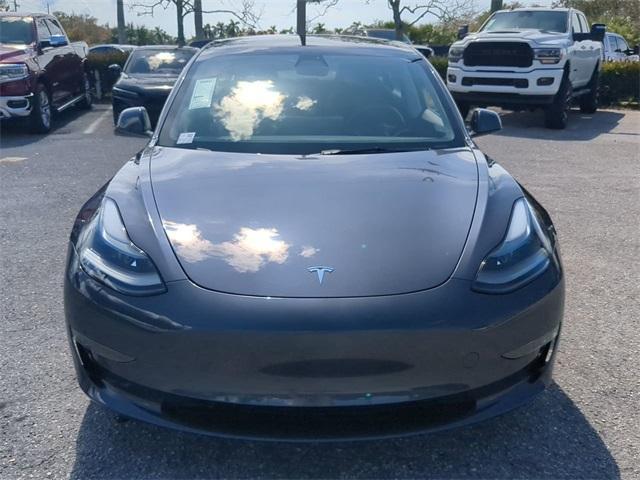 used 2023 Tesla Model 3 car, priced at $34,394