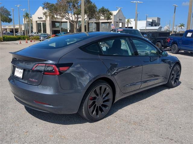 used 2023 Tesla Model 3 car, priced at $34,394