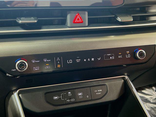 new 2025 Kia Carnival Hybrid car, priced at $56,195