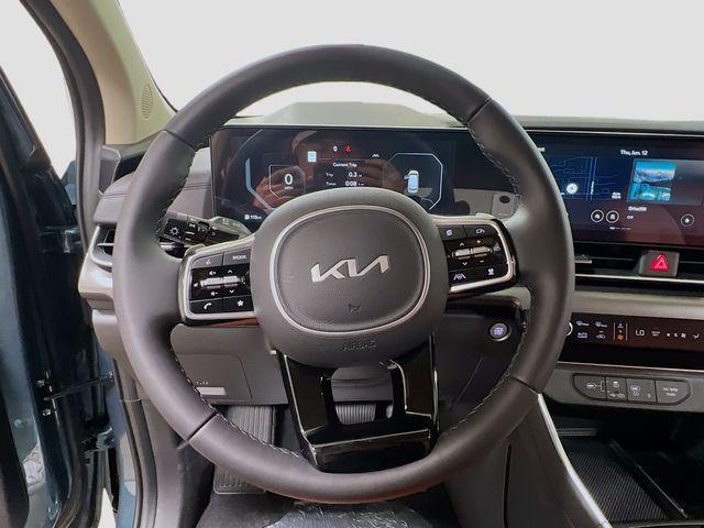 new 2025 Kia Carnival Hybrid car, priced at $56,195