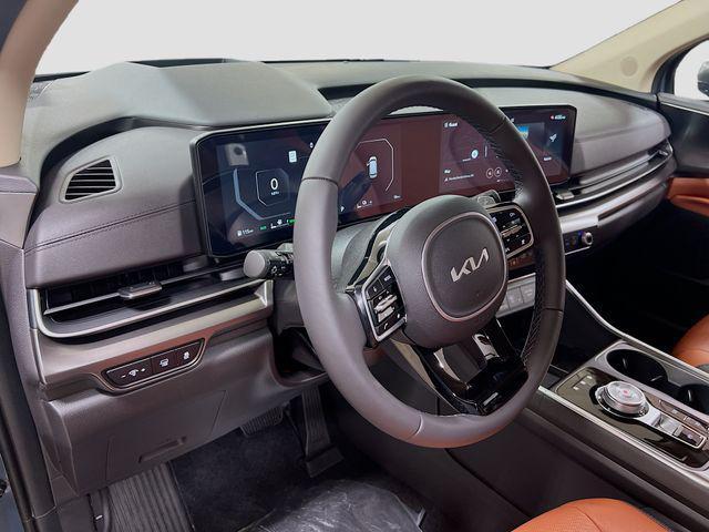 new 2025 Kia Carnival Hybrid car, priced at $56,195