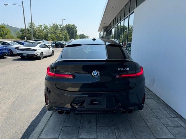 used 2022 BMW X4 M car, priced at $54,978